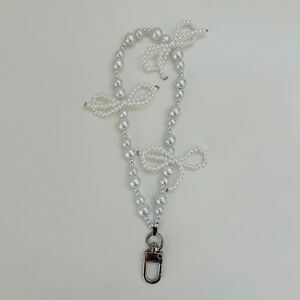 ARTIKL Faux Pearl Bow Bracelet Smart Phone Strap Cord